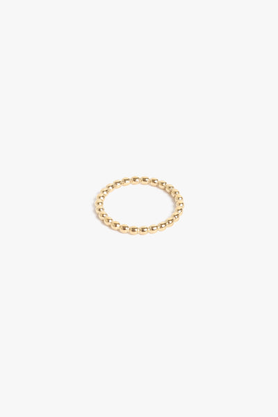 Marrin Costello Jewelry Crown Band dot dainty stacking ring. Available in sizes 6, 7, 8. Waterproof, sustainable, hypoallergenic. 14k gold plated stainless steel.