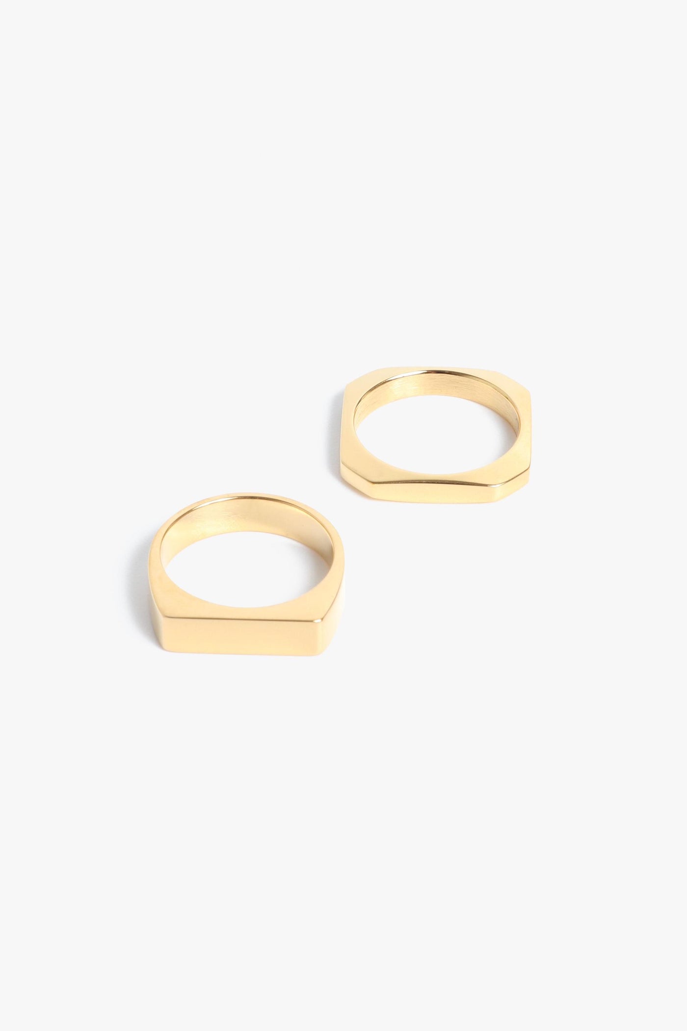 Marrin Costello Jewelry Hendrix Stack geometric signet and quad 2 for 1 ring. Available in sizes 6, 7, 8. Waterproof, sustainable, hypoallergenic. 14k gold plated stainless steel.