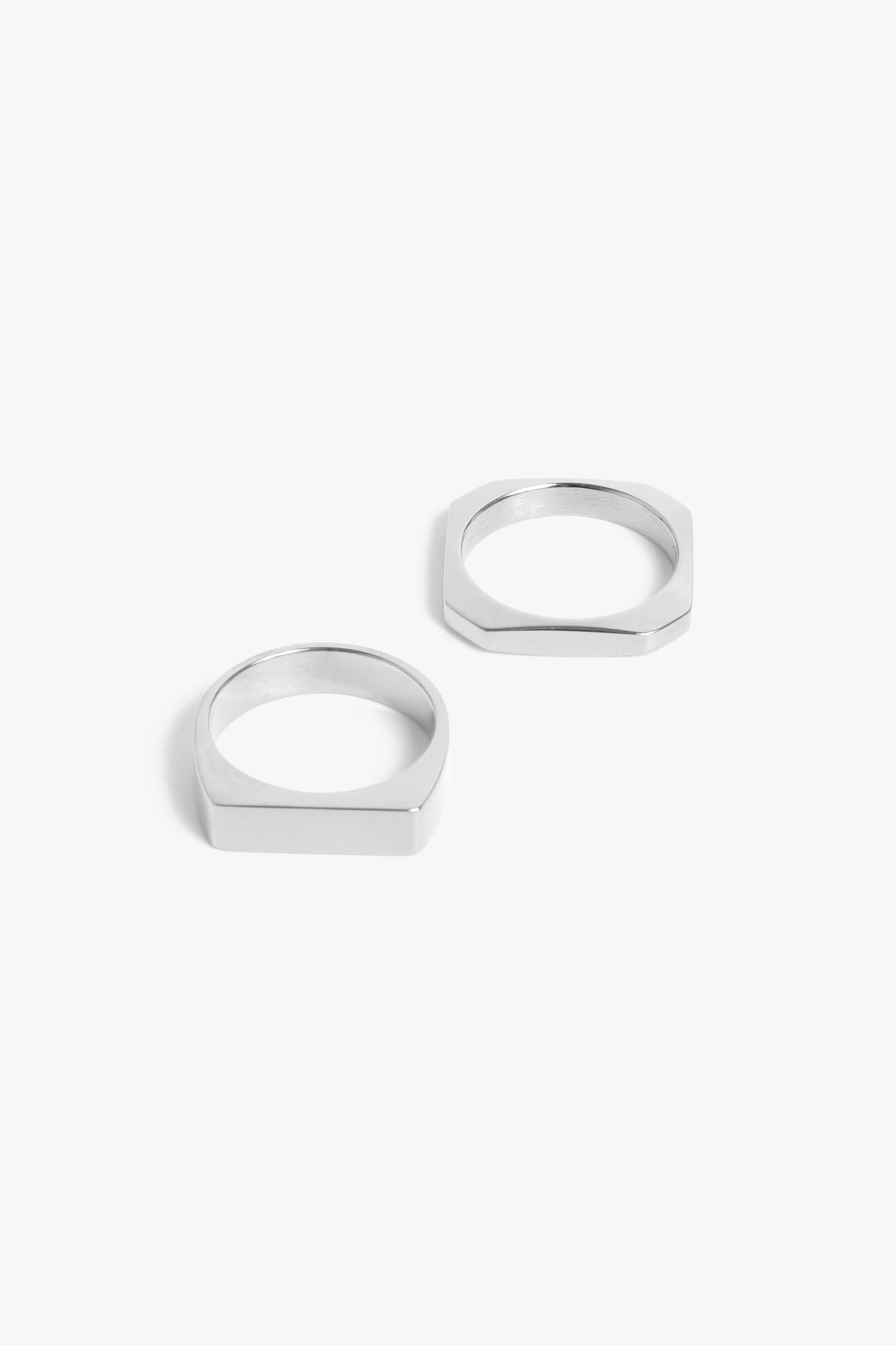 Marrin Costello Jewelry Hendrix Stack geometric signet and quad 2 for 1 ring. Available in sizes 6, 7, 8. Waterproof, sustainable, hypoallergenic. Polished stainless steel.