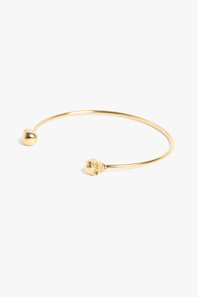 Marrin Costello Jewelry Hyde Cuff skull adjustable bracelet with cuff bracelet opening. Waterproof, sustainable, hypoallergenic. 14k gold plated stainless steel.