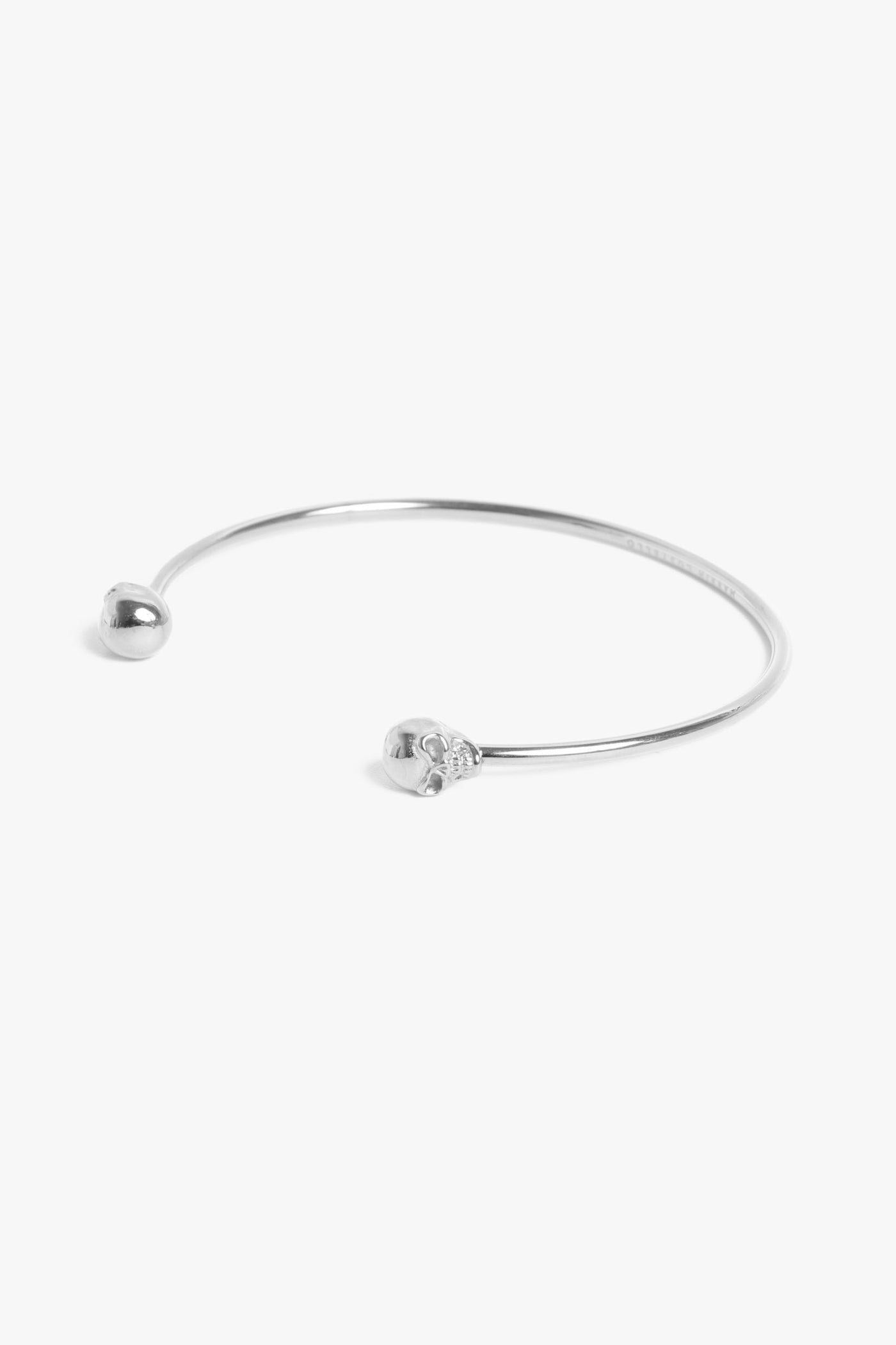 Marrin Costello Jewelry Hyde Cuff skull adjustable bracelet with cuff bracelet opening. Waterproof, sustainable, hypoallergenic. Polished stainless steel.