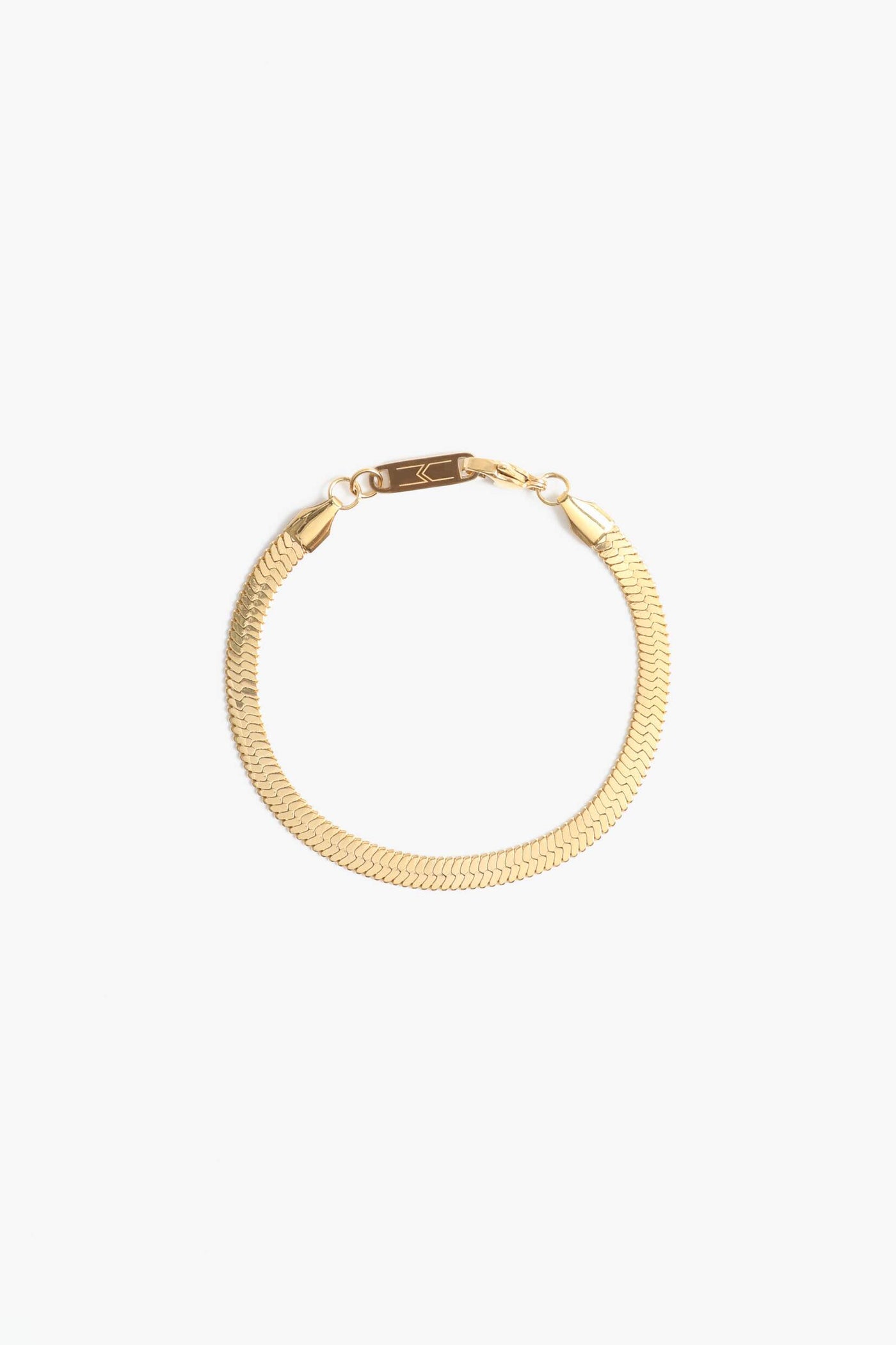 Marrin Costello Jewelry 5mm thick herringbone snake chain bracelet with lobster clasp closure. Waterproof, sustainable, hypoallergenic. 14k gold plated stainless steel.
