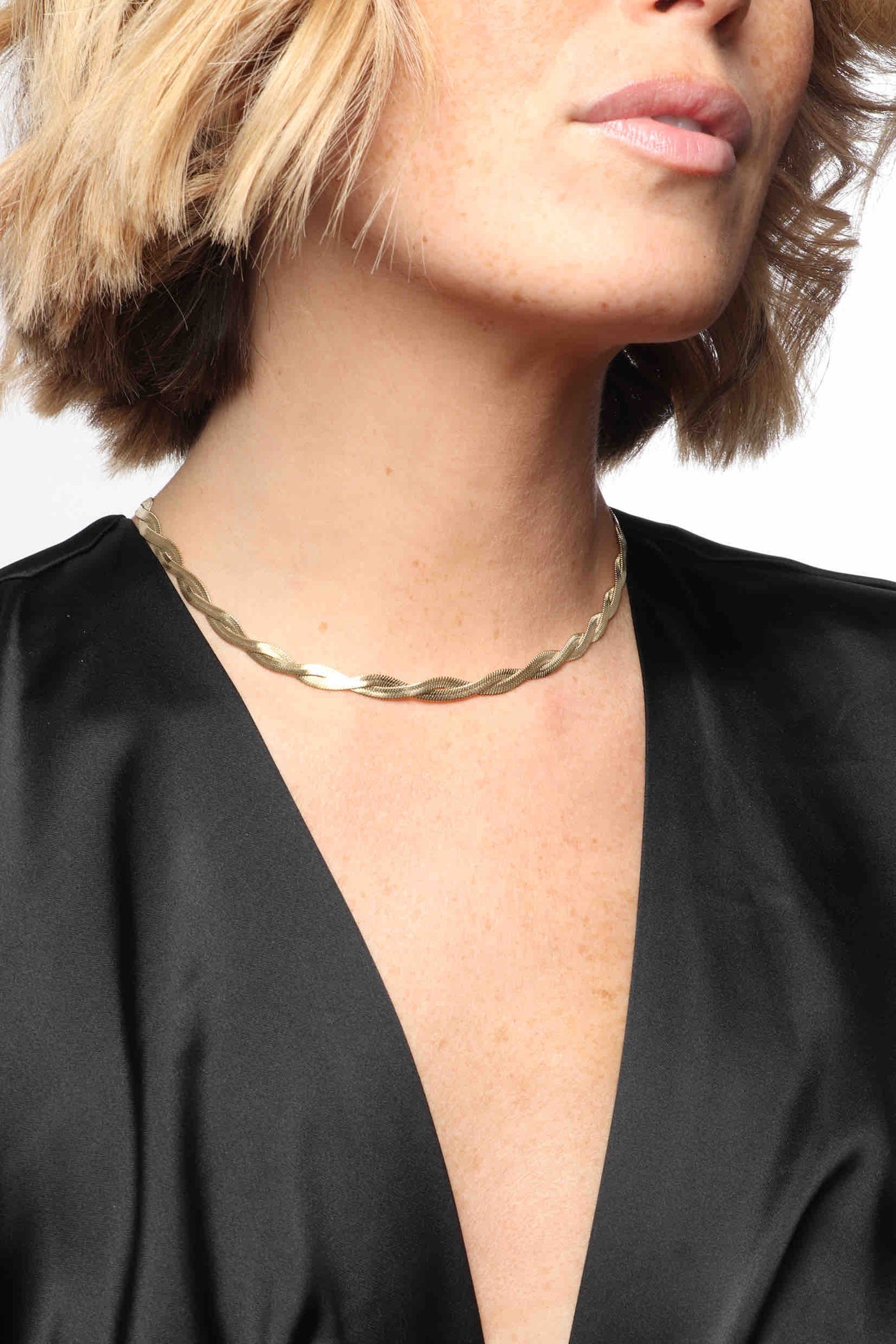 Marrin Costello wearing Marrin Costello Jewelry Ramsey Twist Chain snake herringbone chain braided together with lobster clasp closure and extender. Waterproof, sustainable, hypoallergenic. 14k gold plated stainless steel.